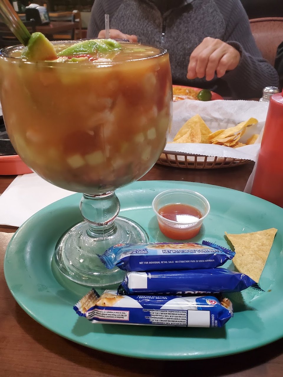Menu page featuring seafood, tacos, and breakfast plates.