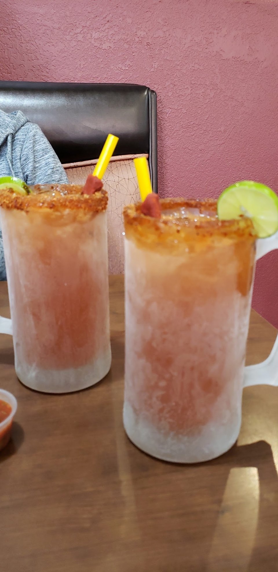Restaurant menu highlighting mariscos and Sinaloa-style dishes.